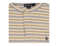 Vintage 90s Nautica Clothing Tag on a T-Shirt
